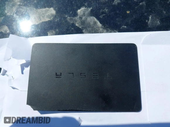 2018 Tesla Model 3 Long Range Battery with VIN 5YJ3E1EA9JF009384, listed as a IAAI auction lot 41544624 with 66,896 mi miles and . Bid and sale history available at DreamBid. Image 11.