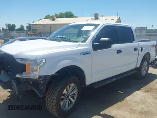 2018 Ford F-150 XL with VIN 1FTEW1EP8JKF82063, listed as a IAAI auction lot 42299414 with 153,706 mi miles and . Bid and sale history available at DreamBid. Image 23.