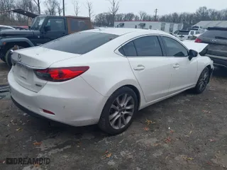 2015 Mazda Mazda6 i Touring with VIN JM1GJ1V66F1173314, listed as a IAAI auction lot 41101860 with 160,338 mi miles. Bid and sale history available at carsss.com. Image 4.