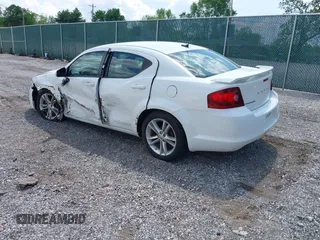 2012 Dodge Avenger SXT with VIN 1C3CDZCB2CN290465, listed as a IAAI auction lot 42082918 with 188,793 mi miles and . Bid and sale history available at carsss.com. Image 3.