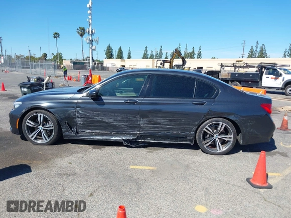 2016 BMW 7 Series 740i with VIN WBA7E2C52GG548048, listed as a IAAI auction lot 41701806 with 72,680 mi miles. Bid and sale history available at carsss.com. Image 14.