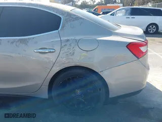 2014 Maserati Ghibli S Q4 with VIN ZAM57RTA8E1095303, listed as a IAAI auction lot 41600587 with 98,215 mi miles. Bid and sale history available at carsss.com. Image 18.