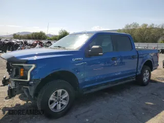 2018 Ford F-150 XL with VIN 1FTEW1EGXJKD26409, listed as a Copart auction lot 59403645 with 122,373 mi miles and Salvage title. Bid and sale history available at DreamBid. Image 1.