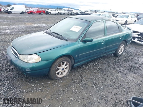 1999 Ford Contour SE Fleet with VIN 1FAFP66L3XK227522, listed as a IAAI auction lot 41702873 with 140,926 mi miles. Bid and sale history available at carsss.com. Image 2.