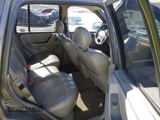 1999 Jeep Grand Cherokee Laredo with VIN 1J4GW58N2XC652678, listed as a IAAI auction lot 42290732 with 145,602 mi miles and . Bid and sale history available at DreamBid. Image 8.