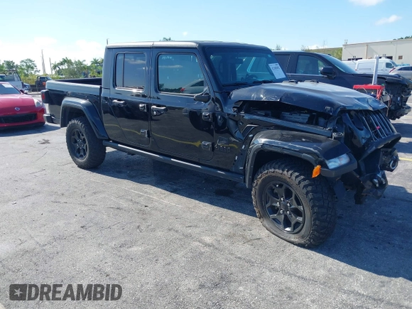 2021 Jeep Gladiator Willys with VIN 1C6HJTAGXML613431, listed as a IAAI auction lot 42180502 with 64,572 mi miles and . Bid and sale history available at DreamBid. Image 1.