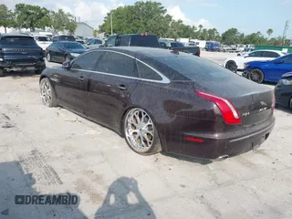 2013 Jaguar XJ Portfolio with VIN SAJWJ2GD2D8V44780, listed as a IAAI auction lot 41875069 with 87,806 mi miles and . Bid and sale history available at DreamBid. Image 3.
