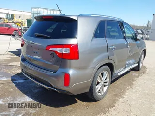2015 Kia Sorento SX with VIN 5XYKWDA74FG591902, listed as a IAAI auction lot 41856991 with 128,471 mi miles. Bid and sale history available at carsss.com. Image 4.