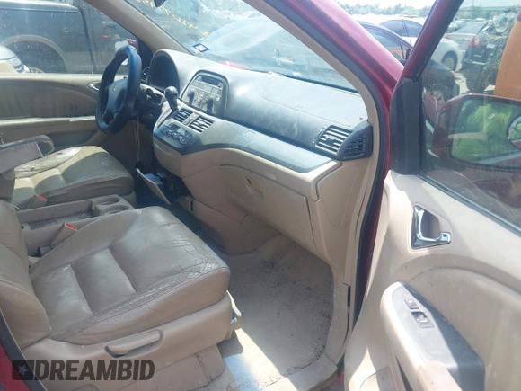 2006 Honda Odyssey EX-L with VIN 5FNRL38606B426919, listed as a IAAI auction lot 42077458 with 125,161 mi miles and . Bid and sale history available at carsss.com. Image 5.