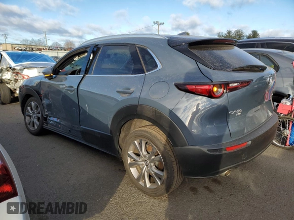 2021 Mazda CX-30 Premium with VIN 3MVDMBDM2MM220739, listed as a Copart auction lot 86848764 with 48,522 mi miles and Salvage title. Bid and sale history available at DreamBid. Image 2.