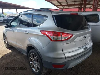 2013 Ford Escape SE with VIN 1FMCU0GX9DUB83512, listed as a IAAI auction lot 41970256 with 69,897 mi miles and . Bid and sale history available at DreamBid. Image 3.