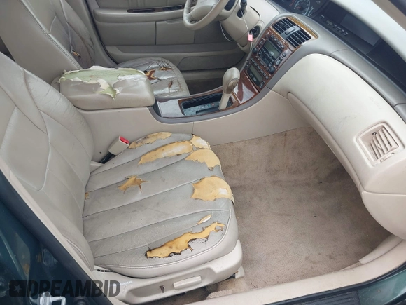 2000 Toyota Avalon XL z VIN 4T1BF28B6YU036865, wystawiony jako IAAI lot #42402305 z przebiegiem 202 265 mil mil oraz . Historia ofert i sprzedaży dostępna na DreamBid. Obrazek 5.