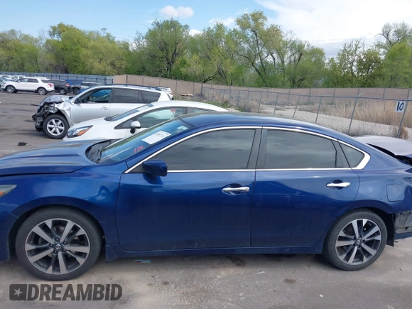 2017 Nissan Altima SV with VIN 1N4AL3AP0HC278809, listed as a IAAI auction lot 42087711 with 113,676 mi miles and . Bid and sale history available at DreamBid. Image 14.