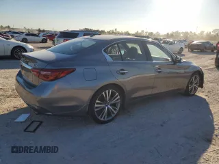 2021 Infiniti Q50 Signature Edition with VIN JN1EV7CP8MM702951, listed as a Copart auction lot 80562724 with 65,016 mi miles and Salvage title. Bid and sale history available at DreamBid. Image 3.