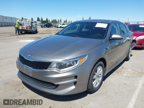 2016 Kia Optima LX with VIN 5XXGT4L36GG098804, listed as a IAAI auction lot 42772231 with 206,471 mi miles and . Bid and sale history available at DreamBid. Image 21.