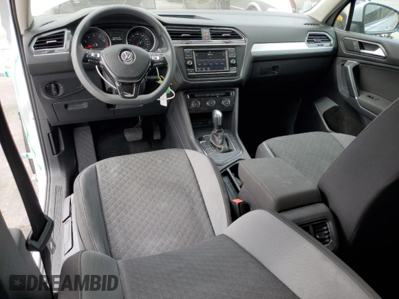 2018 Volkswagen Tiguan S with VIN 3VV1B7AXXJM013468, listed as a Copart auction lot 58371875 with 61,464 mi miles and Salvage title. Bid and sale history available at DreamBid. Image 8.