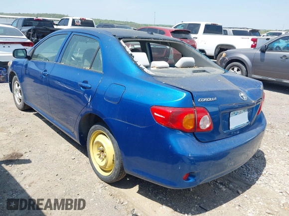 2009 Toyota Corolla with VIN JTDBL40E799044489, listed as a IAAI auction lot 42053660 with 186,356 mi miles. Bid and sale history available at carsss.com. Image 3.