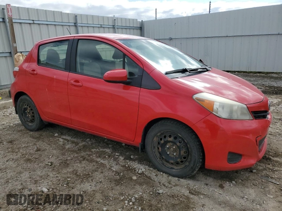 2012 Toyota Yaris L with VIN JTDKTUD32CD517695, listed as a Copart auction lot 57392355 with 201,711 mi miles and Salvage title. Bid and sale history available at DreamBid. Image 4.