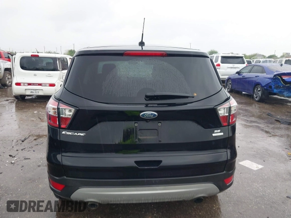 2017 Ford Escape SE with VIN 1FMCU0GD4HUE93661, listed as a IAAI auction lot 41877372 with 63,778 mi miles. Bid and sale history available at carsss.com. Image 16.