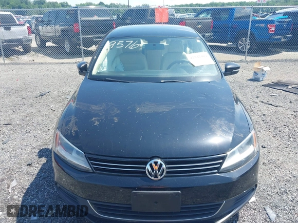 2014 Volkswagen Jetta SE with VIN 3VWD17AJ4EM429576, listed as a IAAI auction lot 42542604 with 142,313 mi miles and . Bid and sale history available at DreamBid. Image 12.
