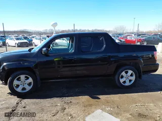 2011 Honda Ridgeline RTL with VIN 5FPYK1F53BB008207, listed as a IAAI auction lot 41745089 with 160,170 mi miles. Bid and sale history available at carsss.com. Image 14.