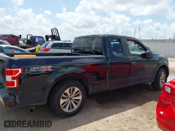 2018 Ford F-150 XL with VIN 1FTEX1CP3JKC39709, listed as a IAAI auction lot 42507999 with 163,478 mi miles and . Bid and sale history available at DreamBid. Image 13.