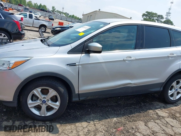 2013 Ford Escape SE z VIN 1FMCU9GX9DUB09981, wystawiony jako IAAI lot #42412927 z przebiegiem 150 499 mil mil oraz . Historia ofert i sprzedaży dostępna na DreamBid. Obrazek 6.