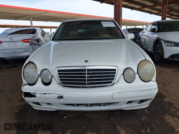 2001 Mercedes-Benz E-Class with VIN WDBJF65J61B183965, listed as a IAAI auction lot 41926279 with 305,436 mi miles. Bid and sale history available at carsss.com. Image 12.