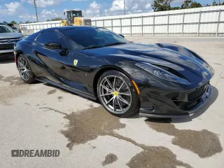 2023 Ferrari 812 z VIN ZFF97CMA4P0291900, wystawiony jako Copart lot #79102854 z przebiegiem 1 279 mil mil oraz Nie do naprawy • Non repairable. Historia ofert i sprzedaży dostępna na DreamBid. Obrazek 4.