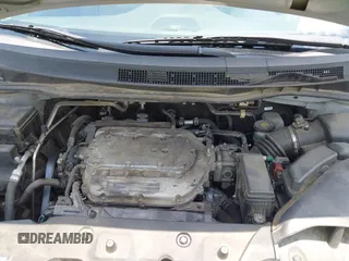 2011 Honda Odyssey Touring with VIN 5FNRL5H99BB058448, listed as a IAAI auction lot 42651432 with 208,581 mi miles and . Bid and sale history available at DreamBid. Image 10.