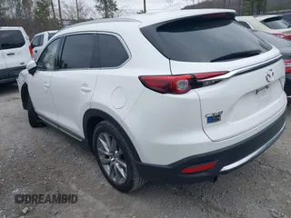 2016 Mazda CX-9 Grand Touring with VIN JM3TCADY0G0113779, listed as a IAAI auction lot 41466750 with 58,035 mi miles and . Bid and sale history available at DreamBid. Image 3.