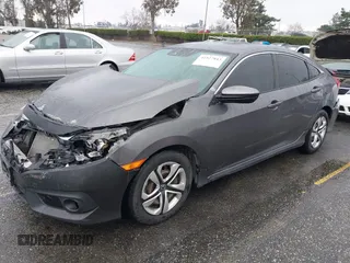 2017 Honda Civic Sedan LX with VIN 19XFC2F68HE212205, listed as a IAAI auction lot 41527843 with 128,401 mi miles. Bid and sale history available at carsss.com. Image 17.
