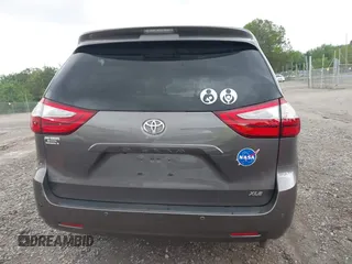 2016 Toyota Sienna XLE with VIN 5TDYK3DC8GS721290, listed as a IAAI auction lot 42127035 with 142,150 mi miles and . Bid and sale history available at DreamBid. Image 16.
