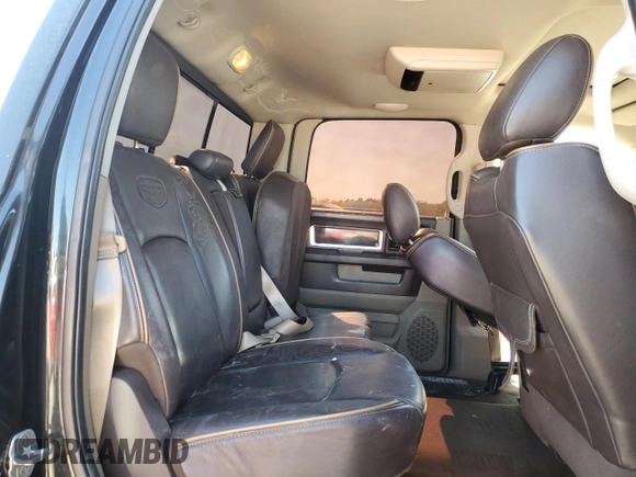 2011 Ram 2500 Laramie Longhorn z VIN 3D7UT2CLXBG604668, wystawiony jako Copart lot #52128635 z przebiegiem 479 971 mil mil oraz Szkoda całkowita • Salvage title. Historia ofert i sprzedaży dostępna na DreamBid. Obrazek 11.