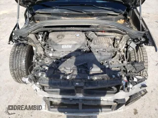 2018 BMW X1 sDrive28i with VIN WBXHU7C35J5H40837, listed as a Copart auction lot 52343122 with 61,458 mi miles. Bid and sale history available at carsss.com. Image 7.