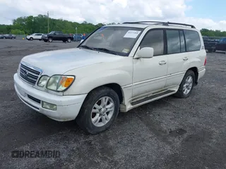 2001 Lexus LX 470 z VIN JTJHT00W613506010, wystawiony jako IAAI lot #42277268 z przebiegiem 186 671 mil mil oraz . Historia ofert i sprzedaży dostępna na DreamBid. Obrazek 2.