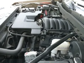 2015 Chevrolet Silverado 1500 LT z VIN 1GCVKREC2FZ336079, wystawiony jako IAAI lot #42960097 z przebiegiem 114 630 mil mil oraz . Historia ofert i sprzedaży dostępna na DreamBid. Obrazek 19.