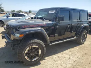2020 Jeep Wrangler Unlimited Rubicon with VIN 1C4HJXFN3LW350249, listed as a Copart auction lot 60696895 with 56,577 mi miles and Salvage title. Bid and sale history available at DreamBid. Image 1.