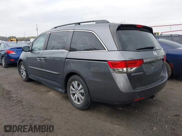 2014 Honda Odyssey EX-L with VIN 5FNRL5H63EB033684, listed as a IAAI auction lot 42025249 with 128,017 mi miles and . Bid and sale history available at carsss.com. Image 3.