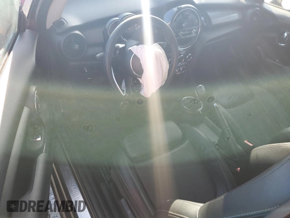 2015 MINI Hardtop с VIN WMWXM5C53FT942331, выставлен на аукционе Copart как лот 54213935 с пробегом Не указан миль и Списание • Salvage title. История ставок и продаж доступна на DreamBid. Изображение 8.
