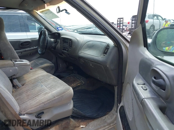 1999 Ford F-150 with VIN 1FTRX17W7XKB20640, listed as a IAAI auction lot 42273497 with 250,232 mi miles and . Bid and sale history available at DreamBid. Image 5.