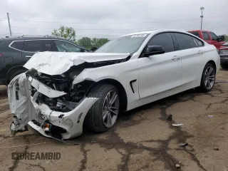 2015 BMW 4 Series 428i xDrive with VIN WBA4A7C52FD413776, listed as a Copart auction lot 58769185 with 90,332 mi miles and Clean title. Bid and sale history available at DreamBid. Image 1.