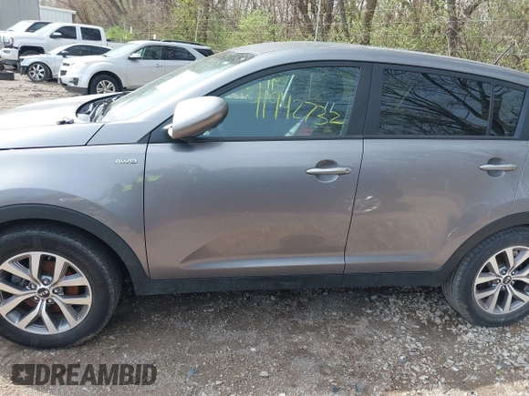 2015 Kia Sportage LX with VIN KNDPBCAC6F7790469, listed as a IAAI auction lot 41942732 with 74,612 mi miles and . Bid and sale history available at DreamBid. Image 14.