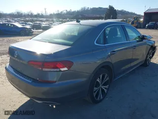 2021 Volkswagen Passat 2.0T SE with VIN 1VWSA7A30MC016434, listed as a IAAI auction lot 41418589 with 64,001 mi miles. Bid and sale history available at carsss.com. Image 4.
