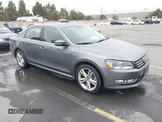 2014 Volkswagen Passat SEL Premium with VIN 1VWCN7A31EC049484, listed as a IAAI auction lot 42827823 with 110,397 mi miles and . Bid and sale history available at DreamBid. Image 1.