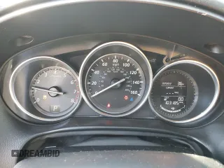 2015 Mazda CX-5 Grand Touring with VIN JM3KE4DY5F0460465, listed as a Copart auction lot 46392605 with 103,185 mi miles and Salvage Title. Bid and sale history available at carsss.com. Image 9.