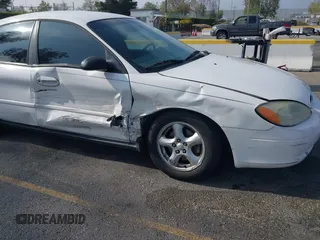 2003 Ford Taurus SES Standard with VIN 1FAFP55293G176494, listed as a IAAI auction lot 42040985 with 95,550 mi miles. Bid and sale history available at carsss.com. Image 6.