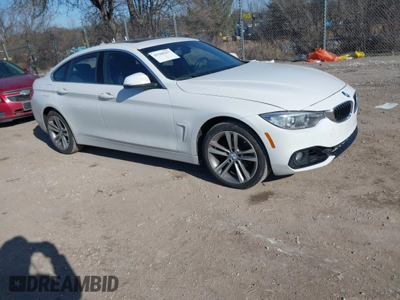 2016 BMW 4 Series 428i xDrive with VIN WBA4C9C59GG138090, listed as a IAAI auction lot 41560267 with 94,010 mi miles and . Bid and sale history available at carsss.com. Image 1.