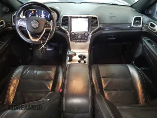 2015 Jeep Grand Cherokee Overland with VIN 1C4RJFCG8FC653117, listed as a Copart auction lot 49254595 with 142,359 mi miles and Clean Title. Bid and sale history available at carsss.com. Image 8.