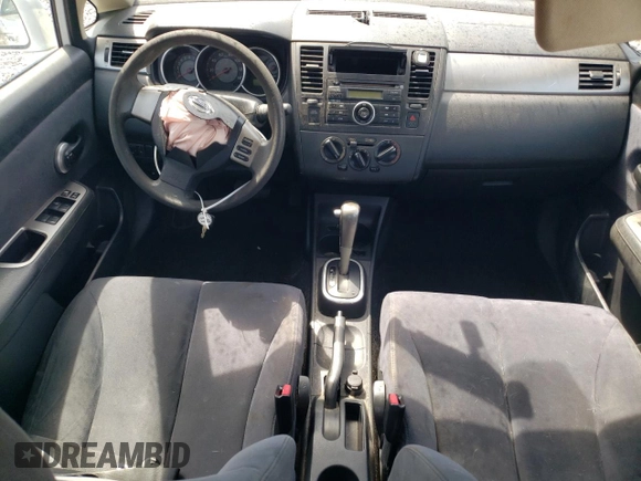 2009 Nissan Versa S with VIN 3N1BC11E89L363388, listed as a Copart auction lot 51301785 with 91,388 mi miles and Salvage Title. Bid and sale history available at DreamBid. Image 8.